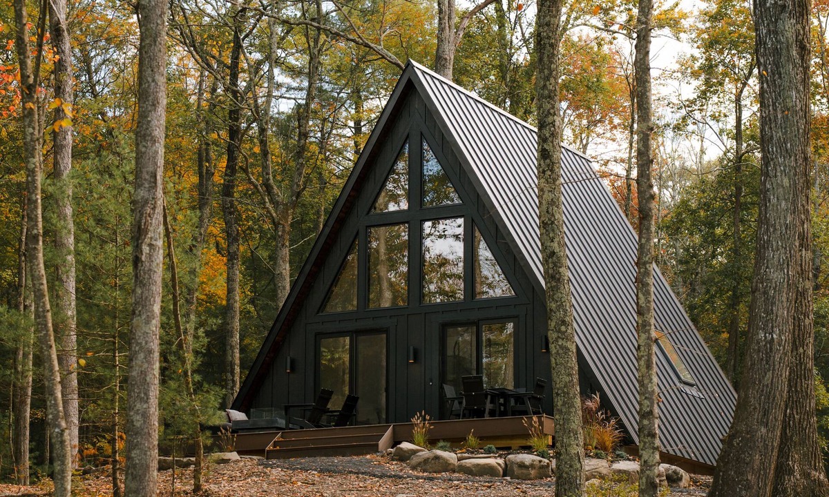 Town of Lumberland Cabin | A modern A-frame, nestled in the woods with relaxing outdoor spaces and firepit.