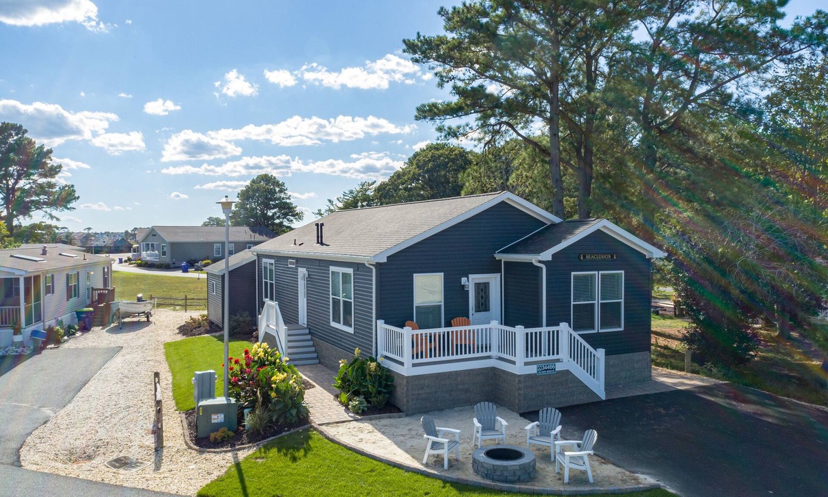 Long Neck House | Bay front retreat - beach, pools, pet friendly!