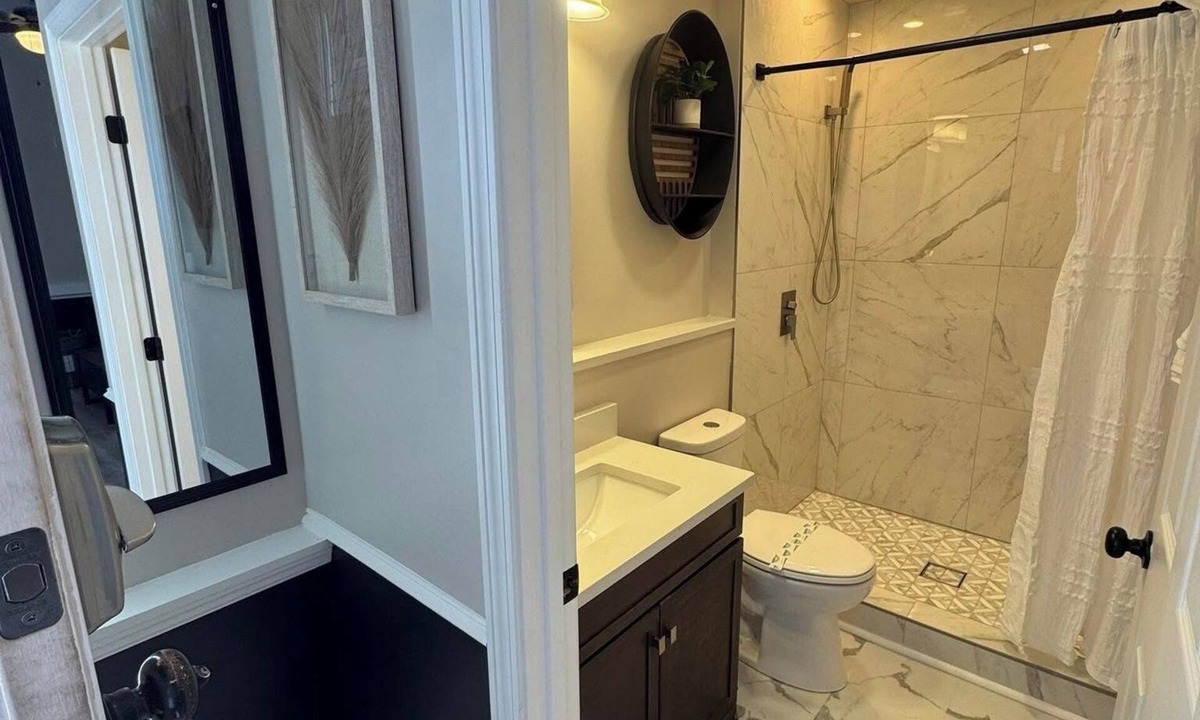Osage Apartment | Bright & Stylish studio featuring an open layout, sleek finishes & fully furnished comfort.