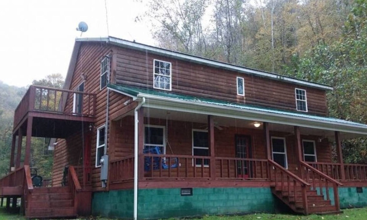 Fort Gay Cabin | The Bunkhouse A two story rustic cabin 3BR 2BA