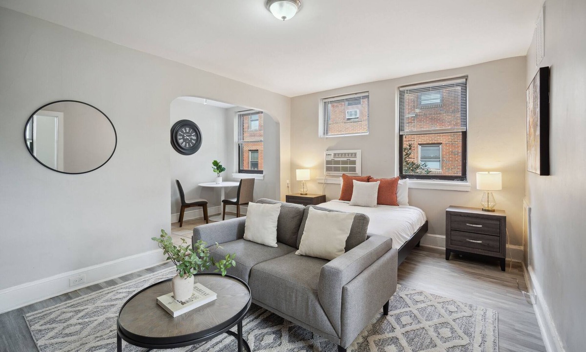 Germantown Apartment | This is a studio apartment with a separate kitchen nook, and a small living nook with a loveseat