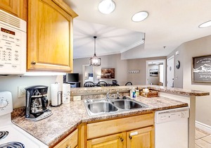 Elegant pool-view condo with free attraction tickets, balcony, & hot tub/pool
