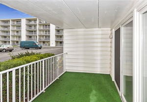 Ground-Floor, Bayside Condo with Patio, WiFi, Central AC, W/D & Shared Pool