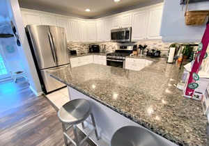 Landis Avenue facing large deck perfect for sunbathing or relaxing. Nice short walk to the beach!