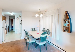 Partial Ocean View Condo in Oceanfront Building with Balcony, WiFi & Laundry