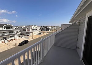 Seashore Sweet Corner Model with great views of the ocean and only steps away to the beach.