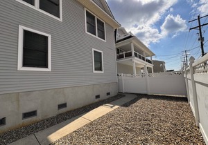 Seashore Sweet Corner Model with great views of the ocean and only steps away to the beach.