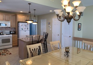 Spacious front decks boast both ocean and bay views