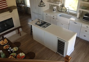 Two blocks from the beach, close to the downtown shops, a timeless “Bay Header”.