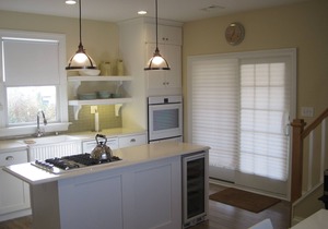 Two blocks from the beach, close to the downtown shops, a timeless “Bay Header”.