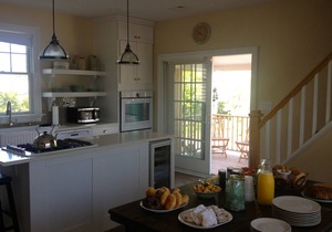 Two blocks from the beach, close to the downtown shops, a timeless “Bay Header”.