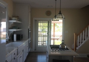 Two blocks from the beach, close to the downtown shops, a timeless “Bay Header”.