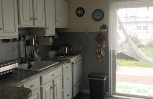 Wildwood Crest House | 1 block from the beach . Ocean view cozy beach house . Backyard with fire pit .