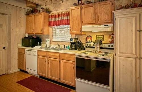 Chalet Village Cabin | 2 Bedroom Pet Friendly Gatlinburg Cabin on a Creek