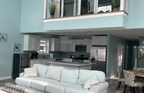Montego Bay House | Beautiful, single home on a wide canal with boat slip and large pier.