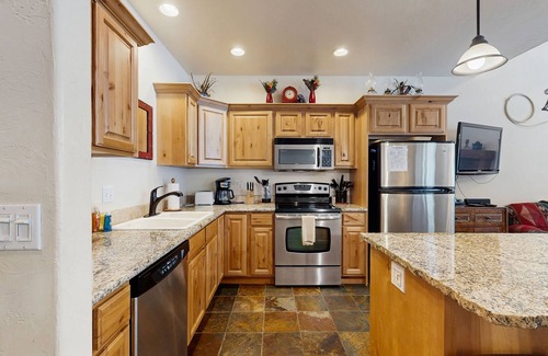 McCall Condo | Golf course-view condo w/private patio & shared pools, hot tub, gym & more