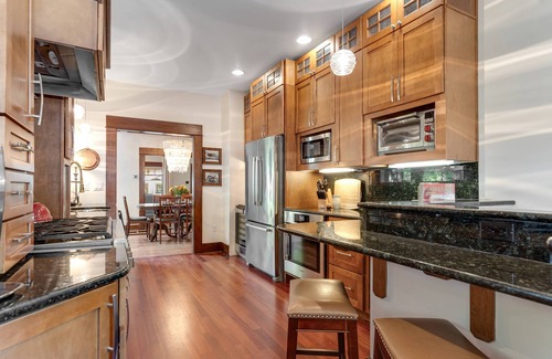 North End House | Iconic North End Bungalow w/Porch Swing | Fam Suite | Private Office/Studio | Walk to Hyde Park!