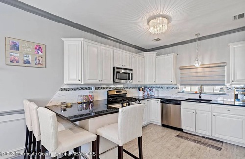 Seaside Heights Condo | Seaside Townhouse, 4BD, 4 Bath, Rooftop deck with ocean/bay views, walk to beach