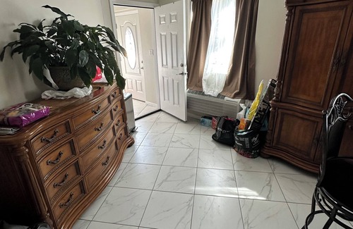 Eastchester Apartment | Spacious 3-bedroom suite with AC/heat, WiFi, utilities, housekeeping included.