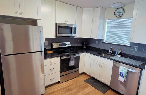 Chincoteague House | Tern Inn - Water Front - Townhouse, deep water dock. LINENS AND TOWELS,