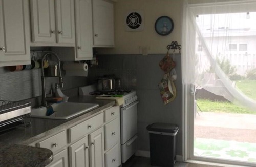 Wildwood Crest House | 1 block from the beach . Ocean view cozy beach house . Backyard with fire pit .