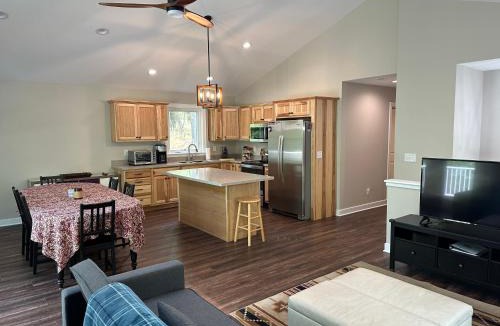 Great Cacapon House | All Decked Up - wifi, view, river access, fire pit, 3 bedrooms, games, family friendly