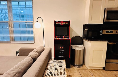 Chinatown Apartment | Arcade 2BR Apt in Walk-up w Laundry