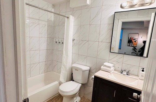Chinatown Apartment | Arcade 2BR Apt in Walk-up w Laundry