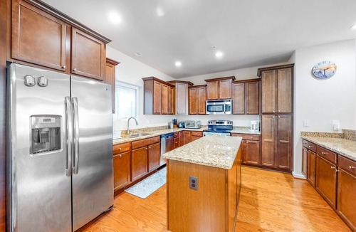 West Ocean City House | Bay-view townhome with private deck, pool access, central AC, & W/D