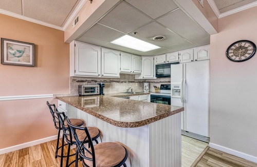 Ocean City Condo | Bayfront condo with marina views and access to shared pool - walk to beach