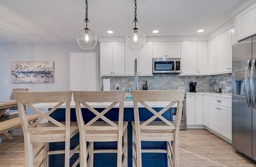 Heron Harbour Isle House | Bayfront, Sleeps 10, Boat Slip, 3 BR/2.5 BATH, Main Pool Open After Labor Day