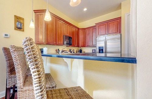 The Commons House | Bayside Resort home with decks, gas fireplace, bikes, ping-pong table, W/D, & AC