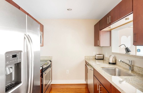 George Washington University Apartment | Bright Foggy Bottom 1BR w/W/D, Pool & Gym, nr Georgetown, by Blueground