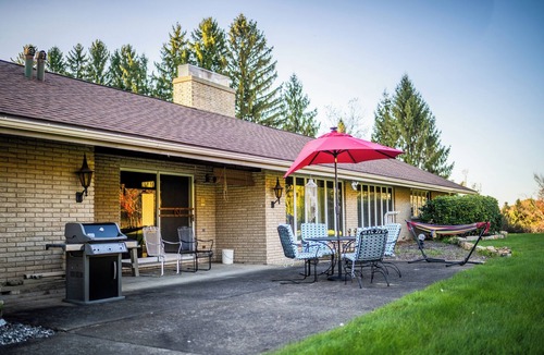 Kane House | Charming 4-BR retro-styled house on large lot in Kane