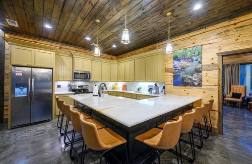 Broken Bow Cabin | Charming Creekside Escape: Pool, Putt-Putt, Game Room & Pet Friendly