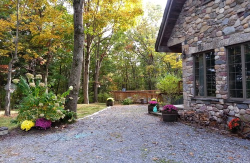 Clinton Corners House | Charming Stone Chalet in Wooded Surroundings with Heated Pool Spring to Fall.