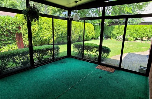 Amherst House | Cheerful 4-bedroom bungalow with indoor fireplace.