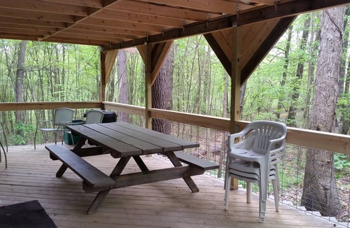 Huntingdon House | Comfy cabin in the woods with huge party deck