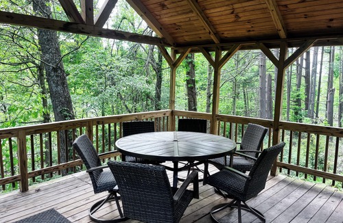 Butler Cabin | Cozy 2BR/2BA cabin tucked in the trees with hot tub, fire pit, covered deck, and fast WiFi.