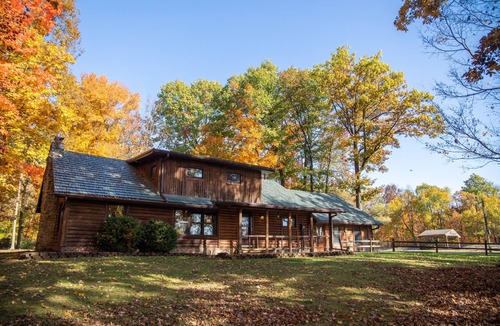 Dola Cabin | Cozy log cabin with pond nestled within 10 wooded acres. Accommodates up to 12!
