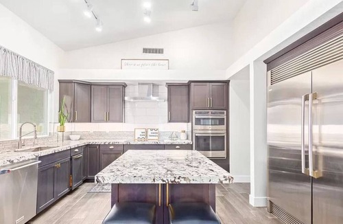 Estate Grove Valencia Est House | Discount! Luxe Oasis w/Pool & Mini-Golf, Game Rm