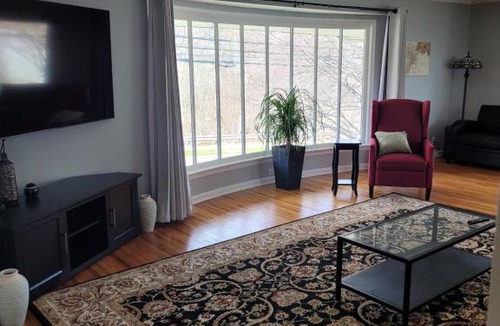 Toledo House | dock, game room, bar and private river view patio
