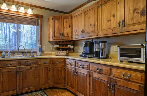 Accident House | Dog-friendly cabin with firepit, deck, private hot tub, fireplace