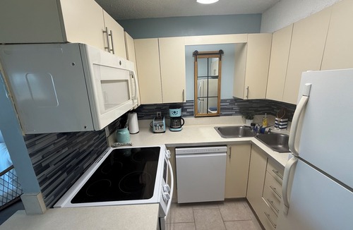 Dam Neck Apartment | Dolphin Beach condo with indoor pool, ocean views, steps to the beach