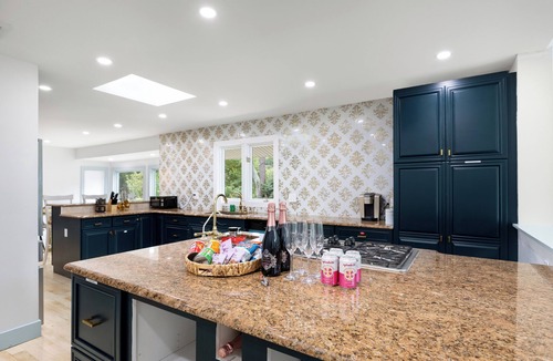 Monroe House | Elegant and spacious home with sauna and heated pool