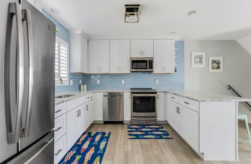 Green Creek House | ENTIRE TOWNHOME, STEPS TO THE BEACH WITH POOL LOCATED IN THE OCEAN SANDS IN WWC!
