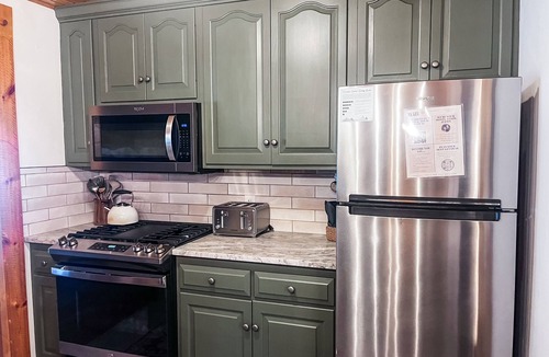 Butler Cabin | Escape to the wood—featuring hot tub, private trails, fire pit, peaceful seclusion. Dogs welcome.