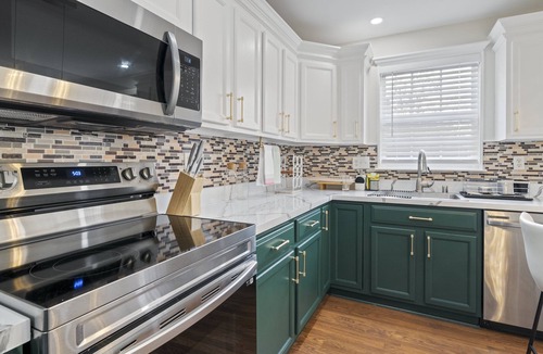 Owings Mills House | Experience Elevated Comfort: Luxe Breeze Townhouse.