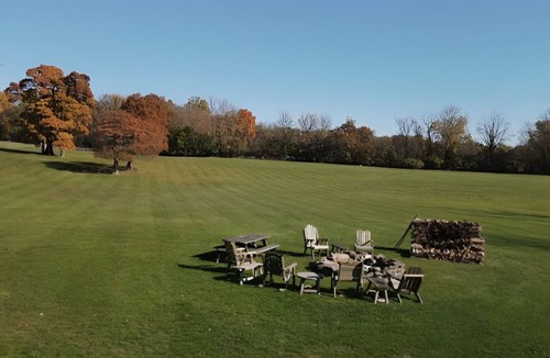 Columbia House | Family Farm Estate: Private Outdoor Paradise with Two Houses, Pond, & Golf Range