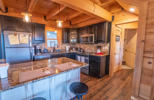 Hendersonville Cabin | Family-Friendly Log Cabin with Hot Tub, Fire Pit & Game Room – Pet Welcome!